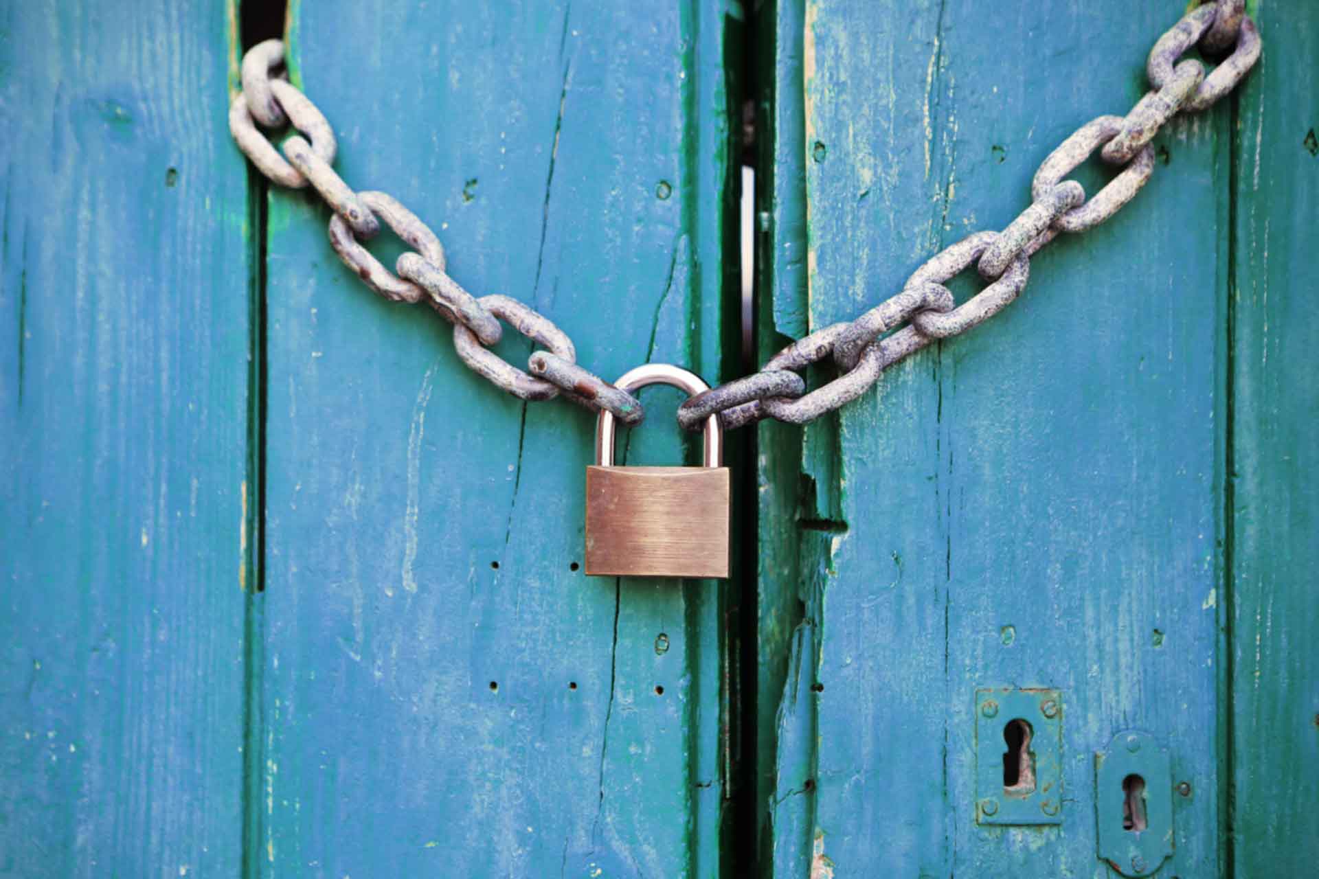 padlock and chain across a door